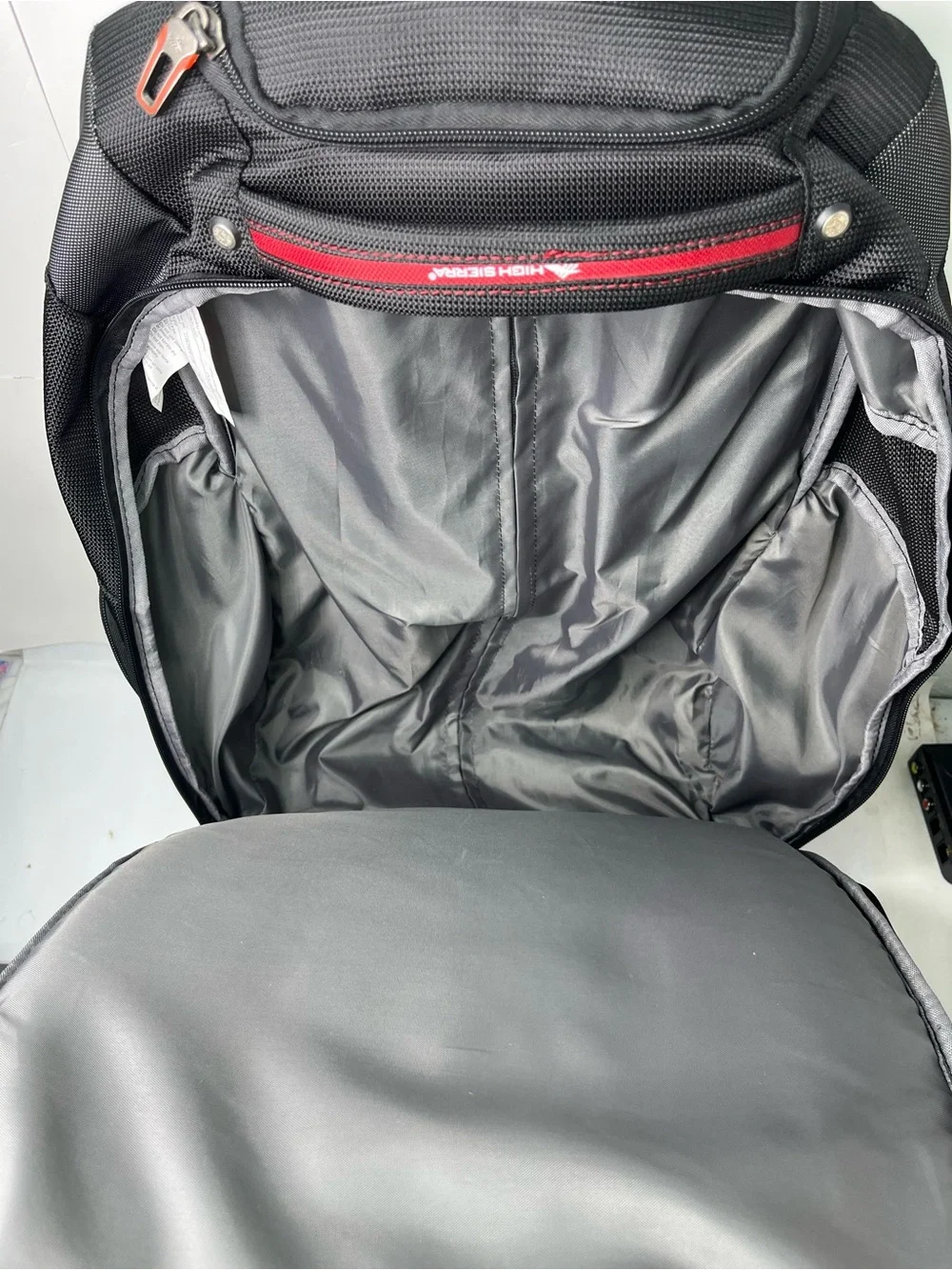 High Sierra Adventure Travel 7 Wheeled Backpack Rolling Carry-On Luggage